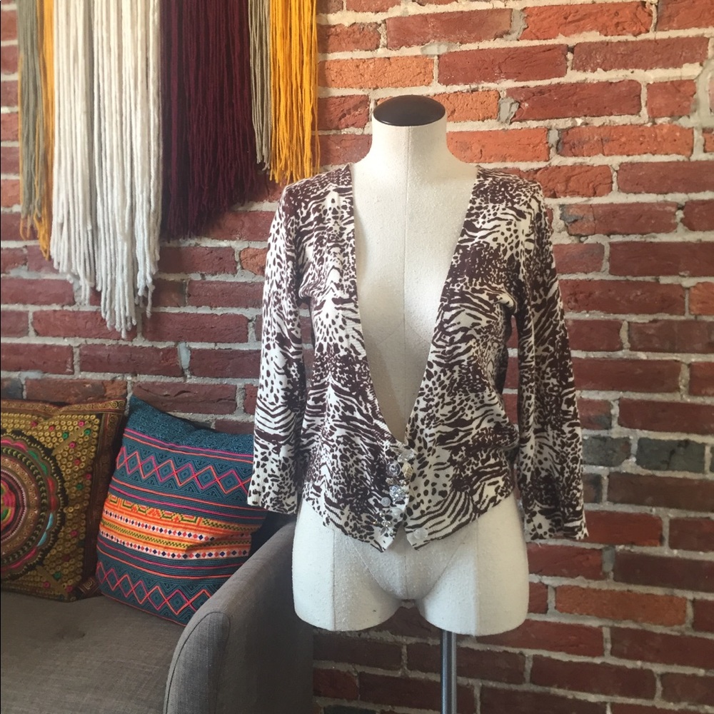 Delia’s animal print cardigan lewk